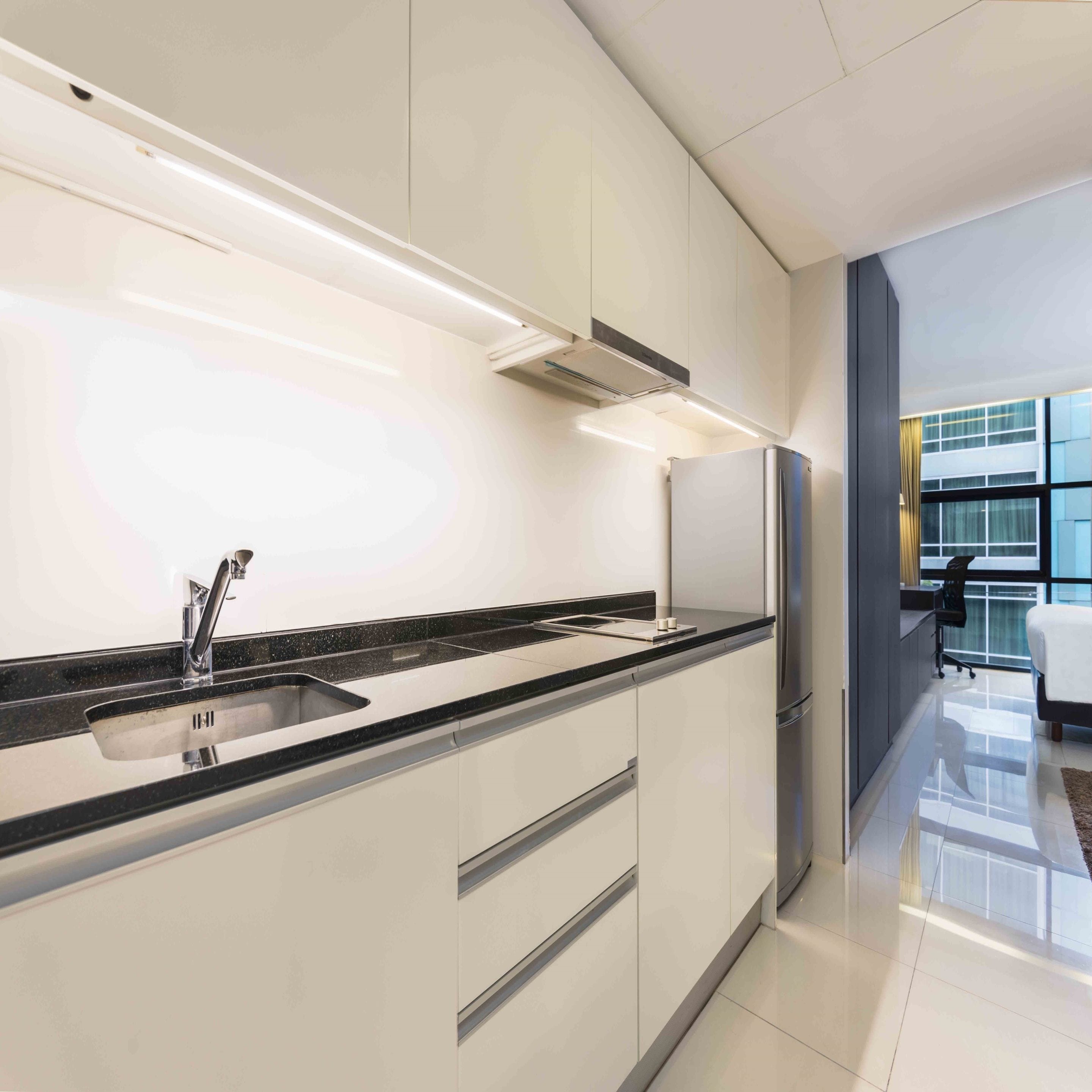 full-sized fridge, microwave, stovetop, coffee/tea maker