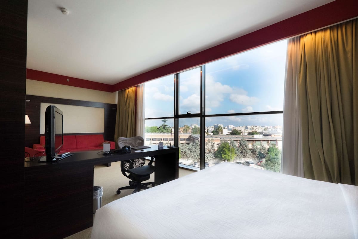 Family Suite, 1 King Bed | Down comforters, minibar, in-room safe, desk