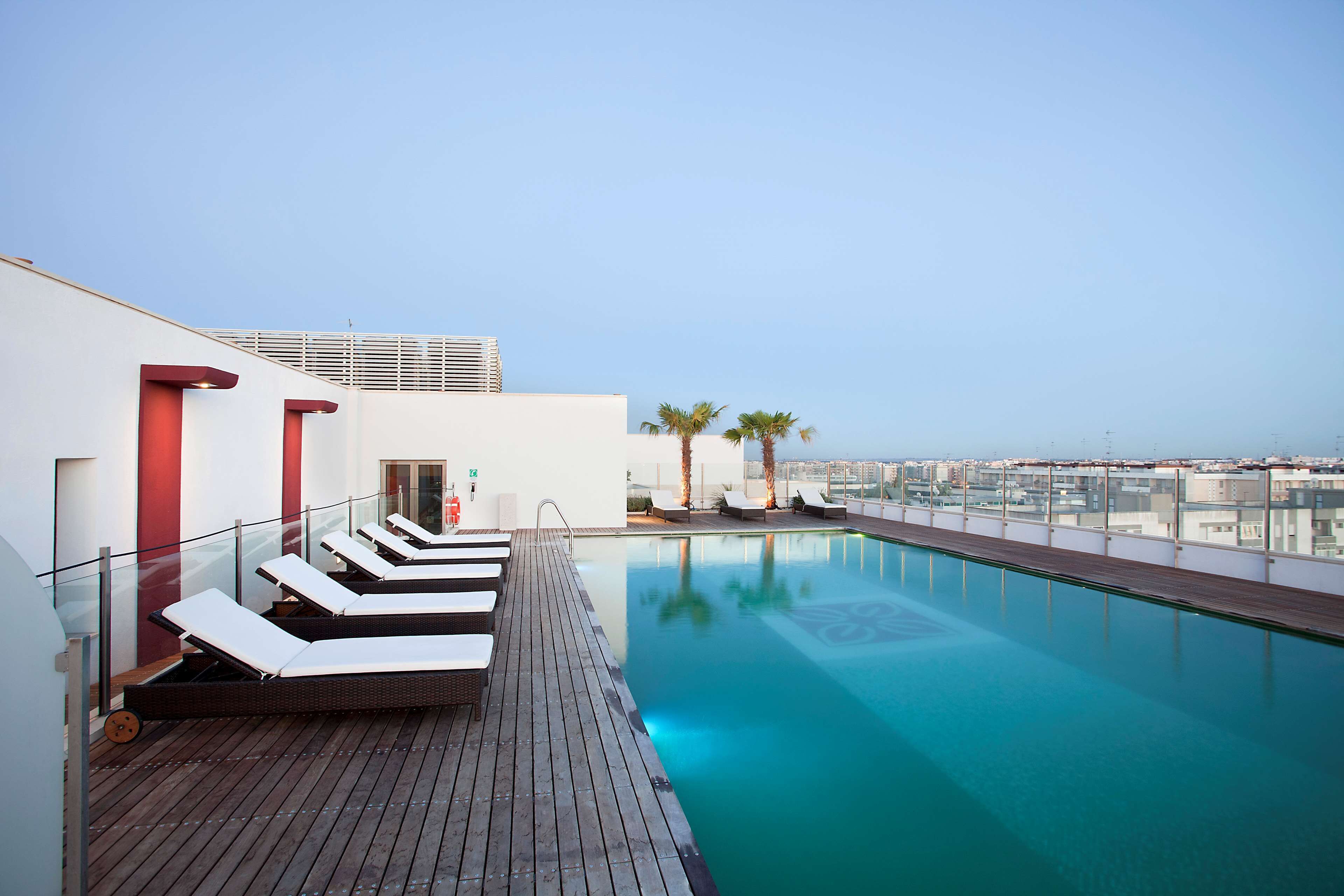 seasonal outdoor pool, pool loungers