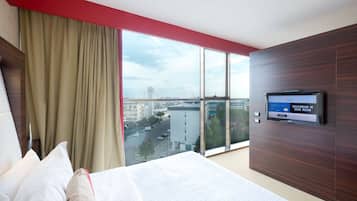 Suite, 1 King Bed | Down comforters, minibar, in-room safe, desk