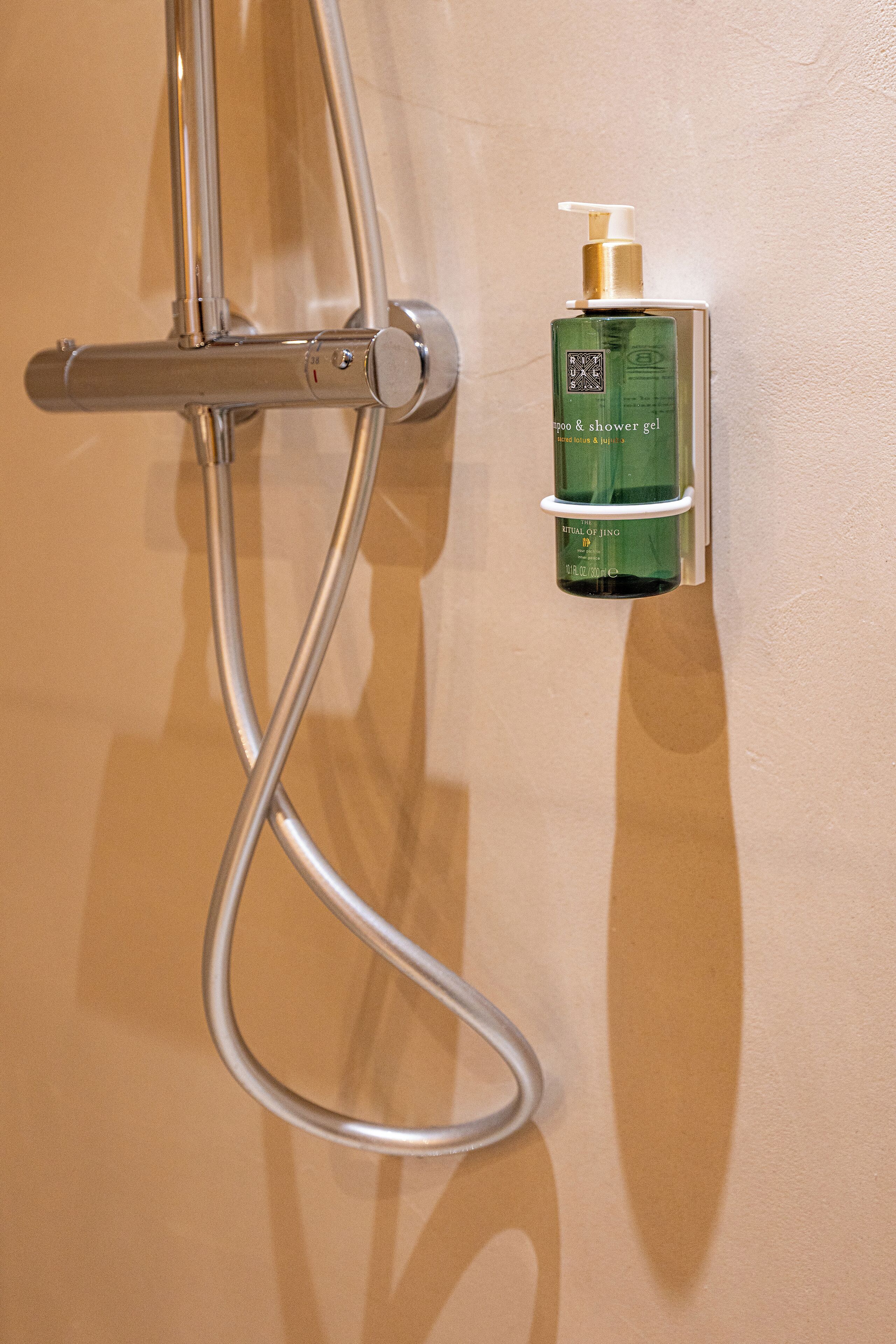 shower, eco-friendly toiletries, hair dryer, towels