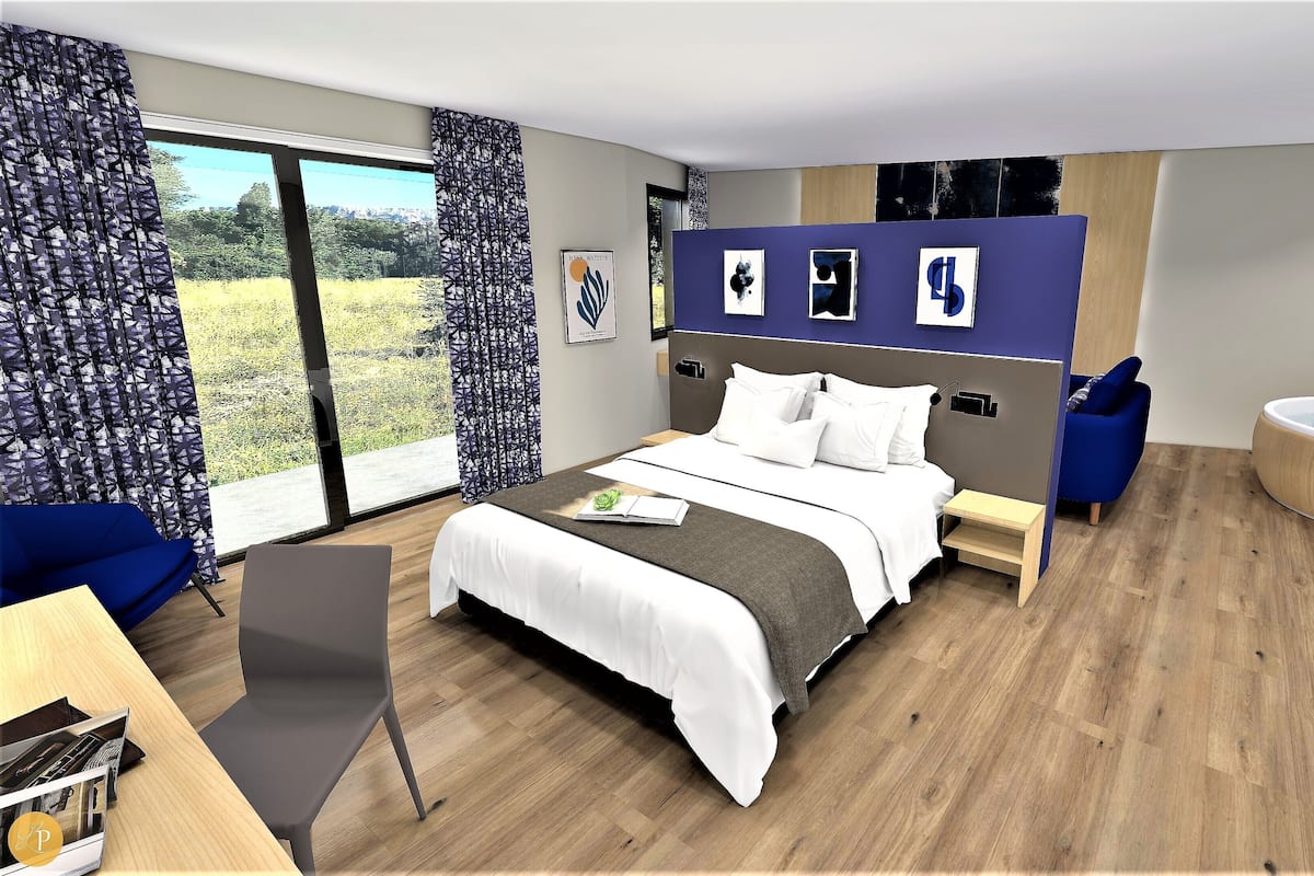 Suite Premium | Minibar, caja de seguridad en la habitación y escritorio