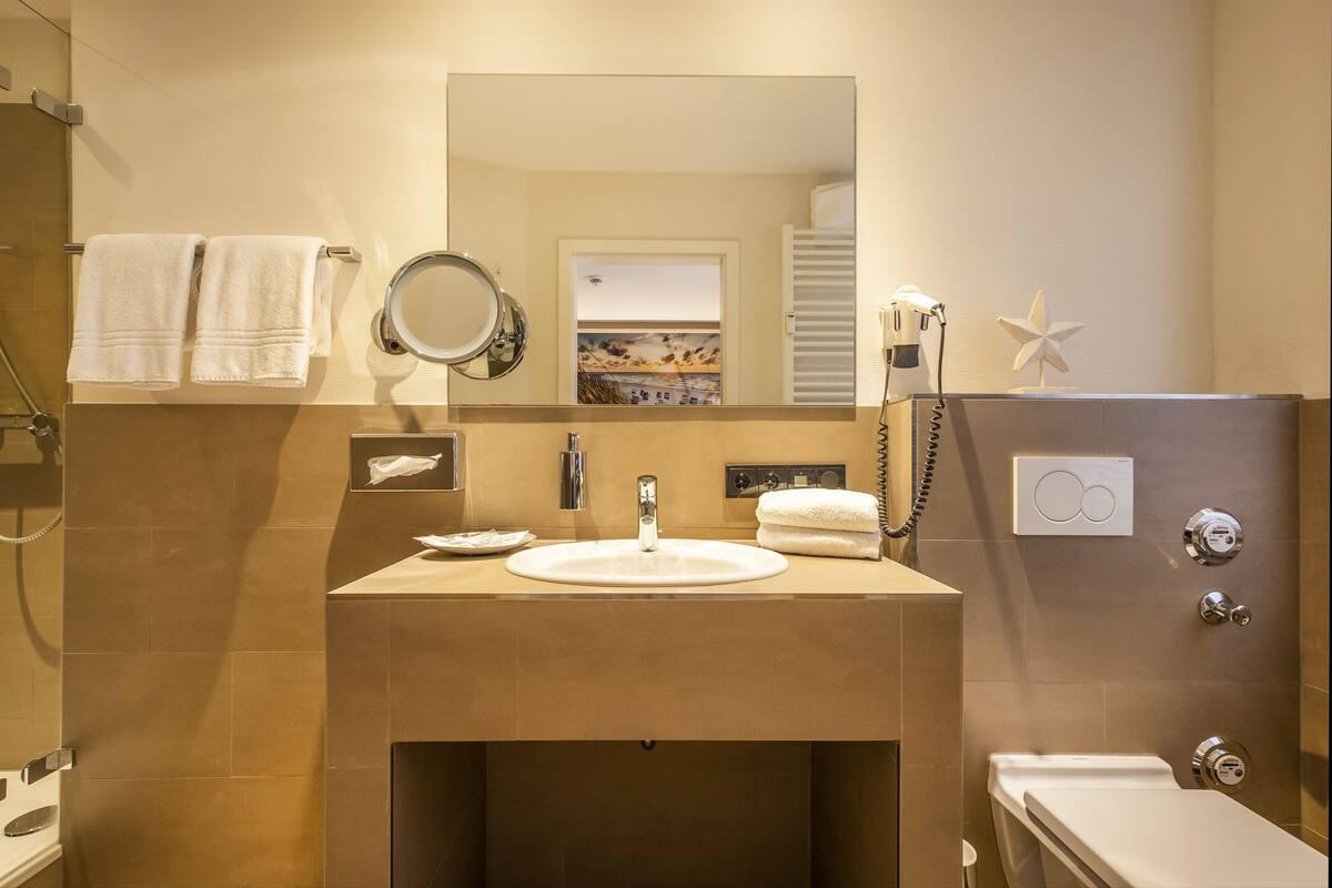 free toiletries, hair dryer, bathrobes, towels