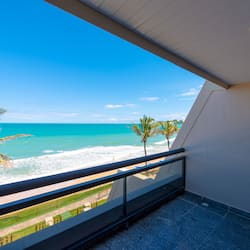 Enjoy breathtaking ocean views from this balcony with a clear view of the beach.