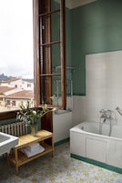 Deluxe Double Room | Bathroom | Shower, hair dryer, bidet, towels