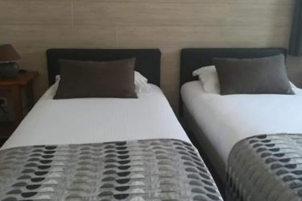 room, 2 single beds | in-room safe, desk, soundproofing, free cots/infant beds