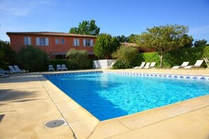 Seasonal outdoor pool, pool umbrellas