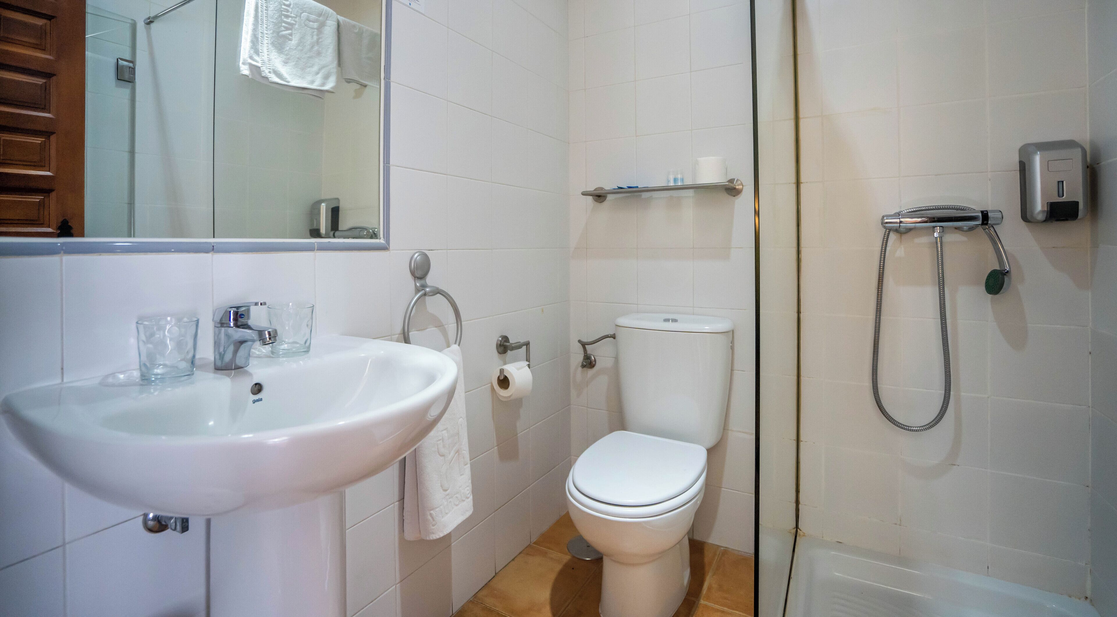 shower, eco-friendly toiletries, hair dryer, towels