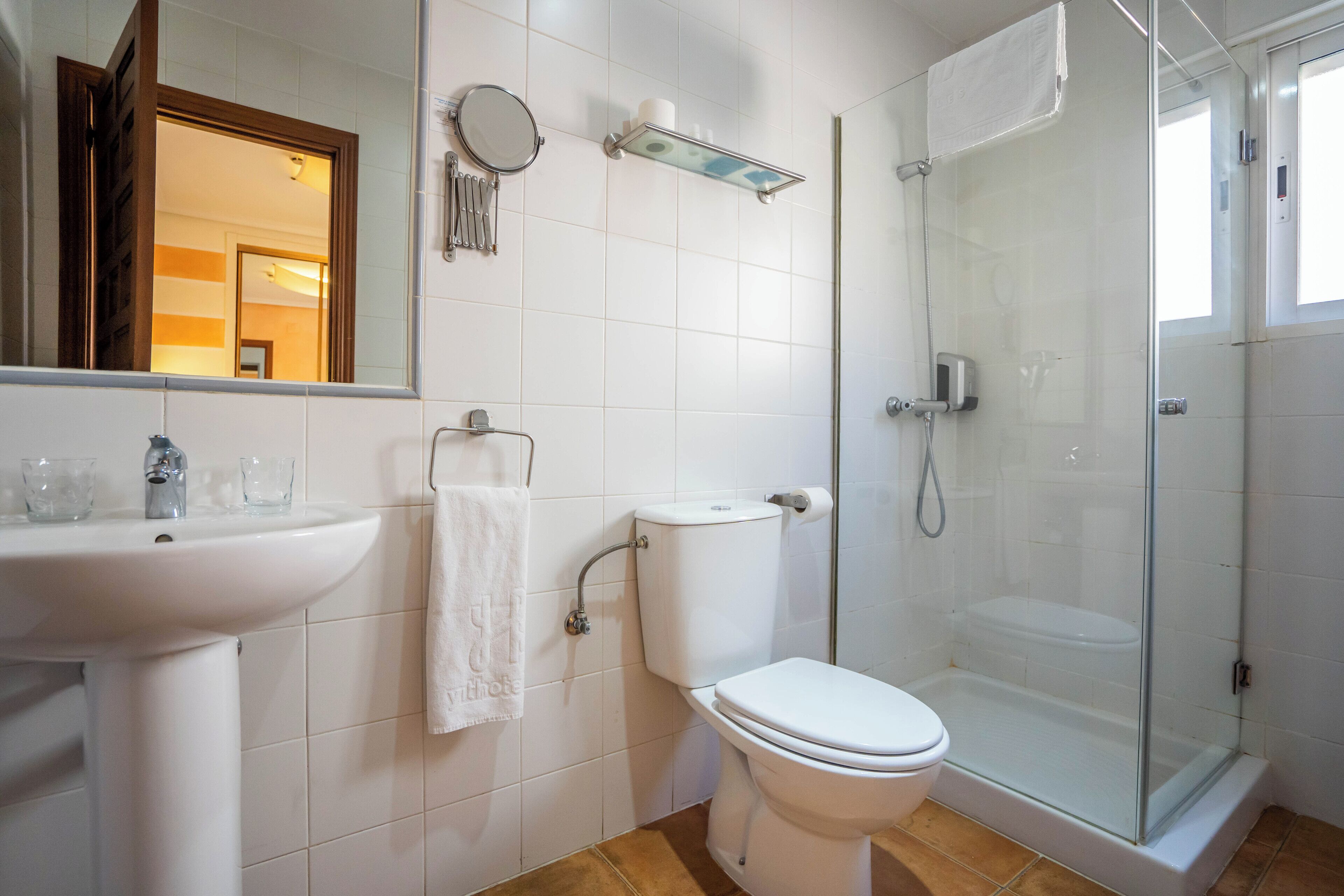 shower, eco-friendly toiletries, hair dryer, towels