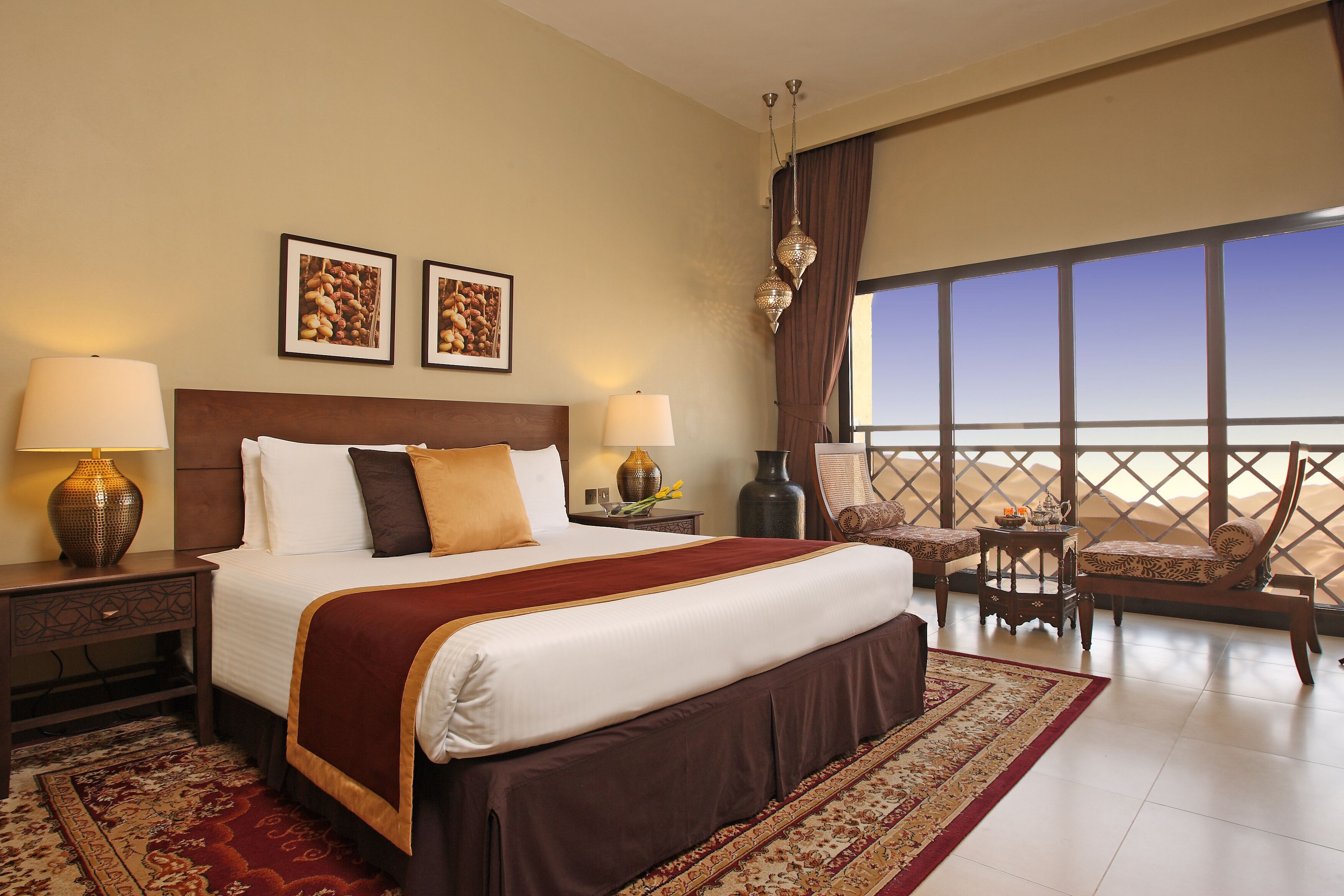 tilal queen room dune view | premium bedding, minibar, in-room safe, desk