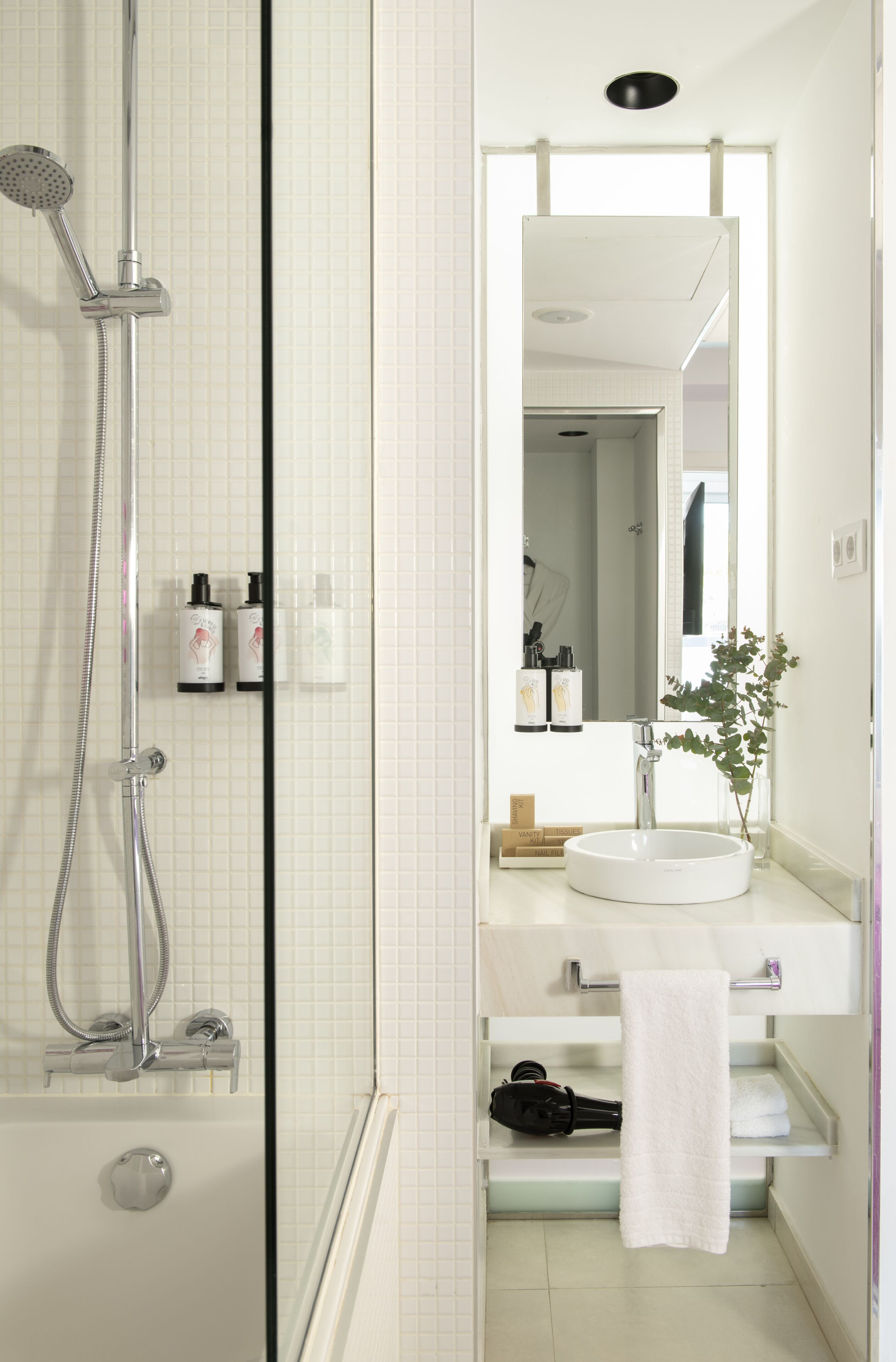 eco-friendly toiletries, hair dryer, towels