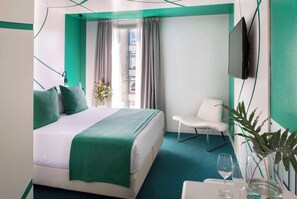 Habitación Deluxe | Edredones de plumas, minibar, caja fuerte y escritorio