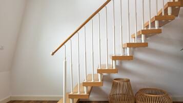 One-bedroom Duplex Suite XL with balcony | Area keluarga | Smart TV