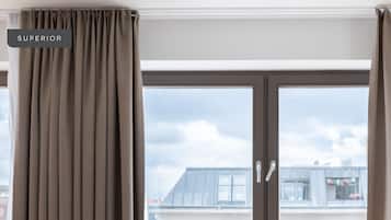 One-bedroom Suite L | Zona de estar | Una Smart TV