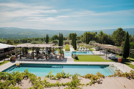 Indoor pool, 2 outdoor pools, open 9:00 AM to 6:00 PM, pool umbrellas. Coquillade Provence - Relais & Chateaux