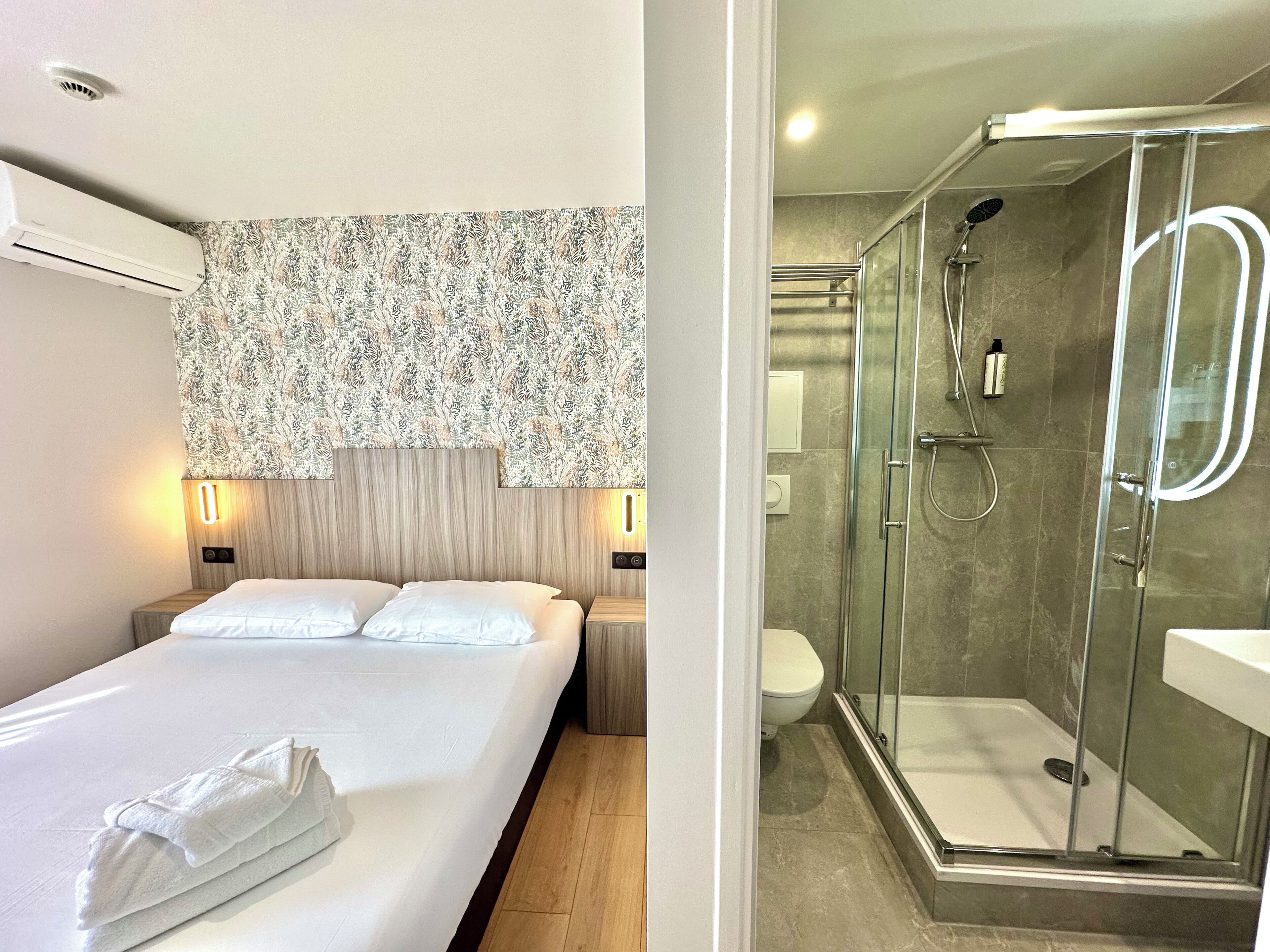 Habitación Confort doble | Escritorio, camas supletorias, wifi gratis y ropa de cama