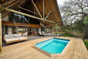 Outdoor pool, open 6 AM to 10 PM, sun loungers