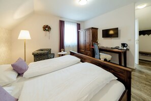 Colchones con pillow-top, minibar y caja de seguridad en la habitación 