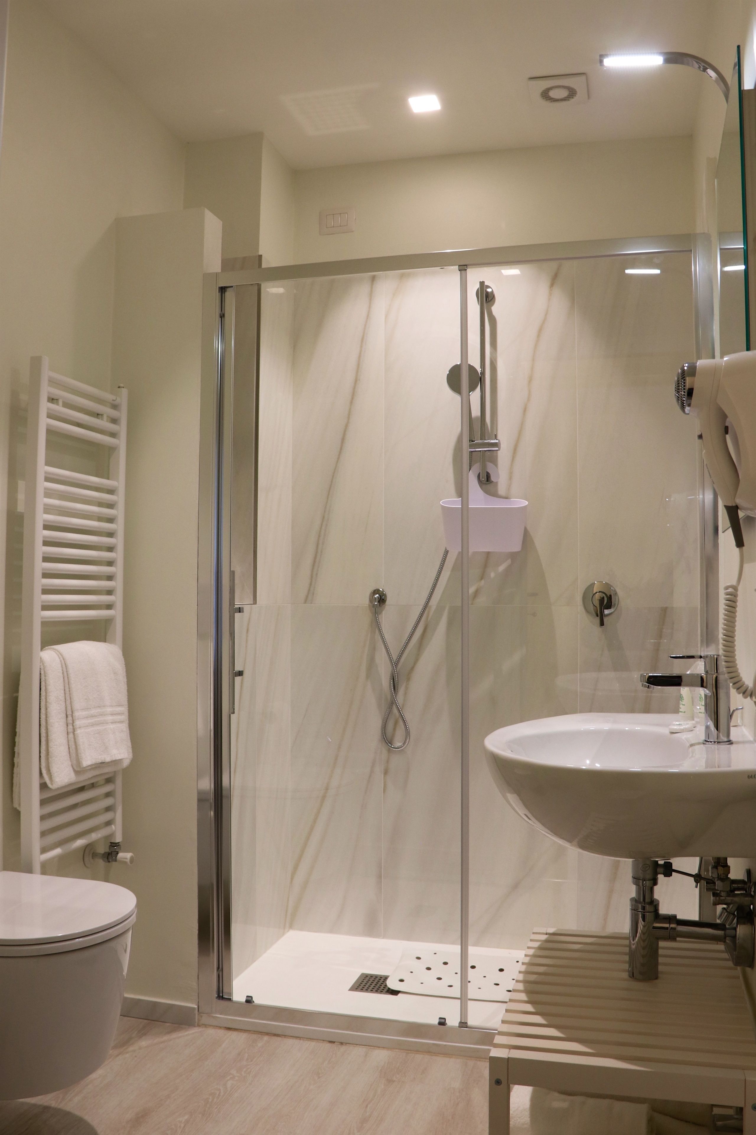 Shower, deep soaking tub, designer toiletries, hair dryer