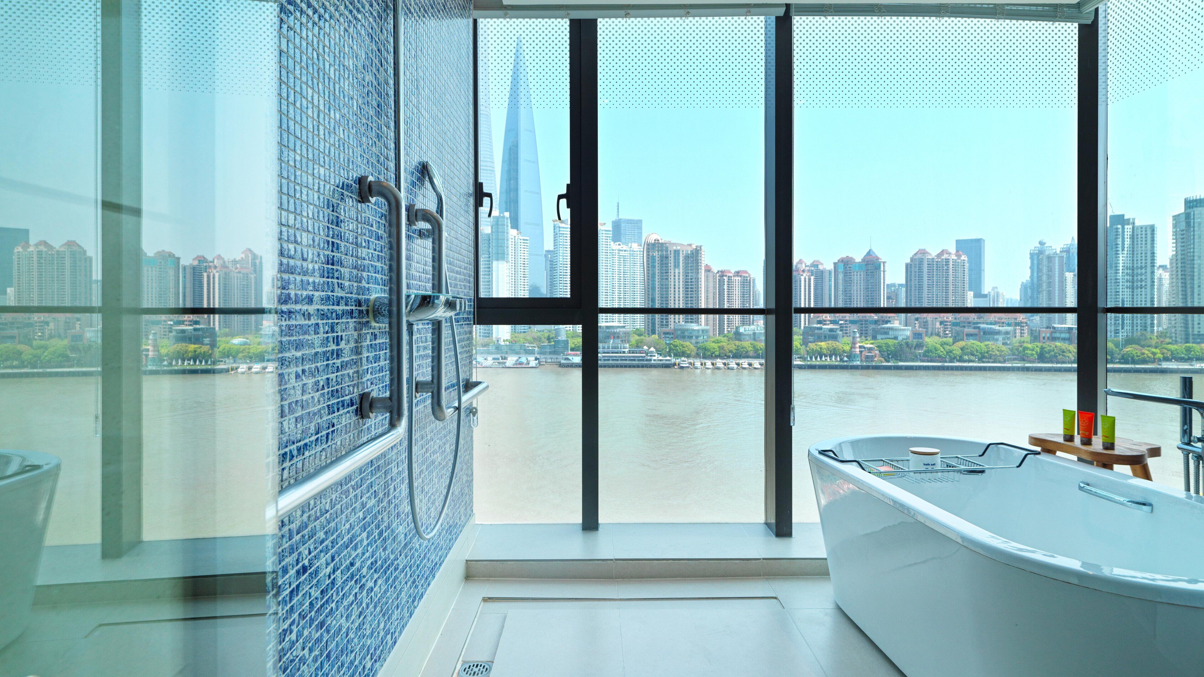 designer toiletries, hair dryer, bathrobes, slippers