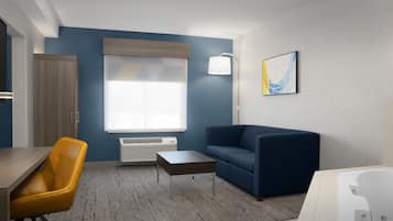 Suite, 1 cama King size, con acceso para personas discapacitadas, hidromasaje | Caja de seguridad en la habitación y escritorio