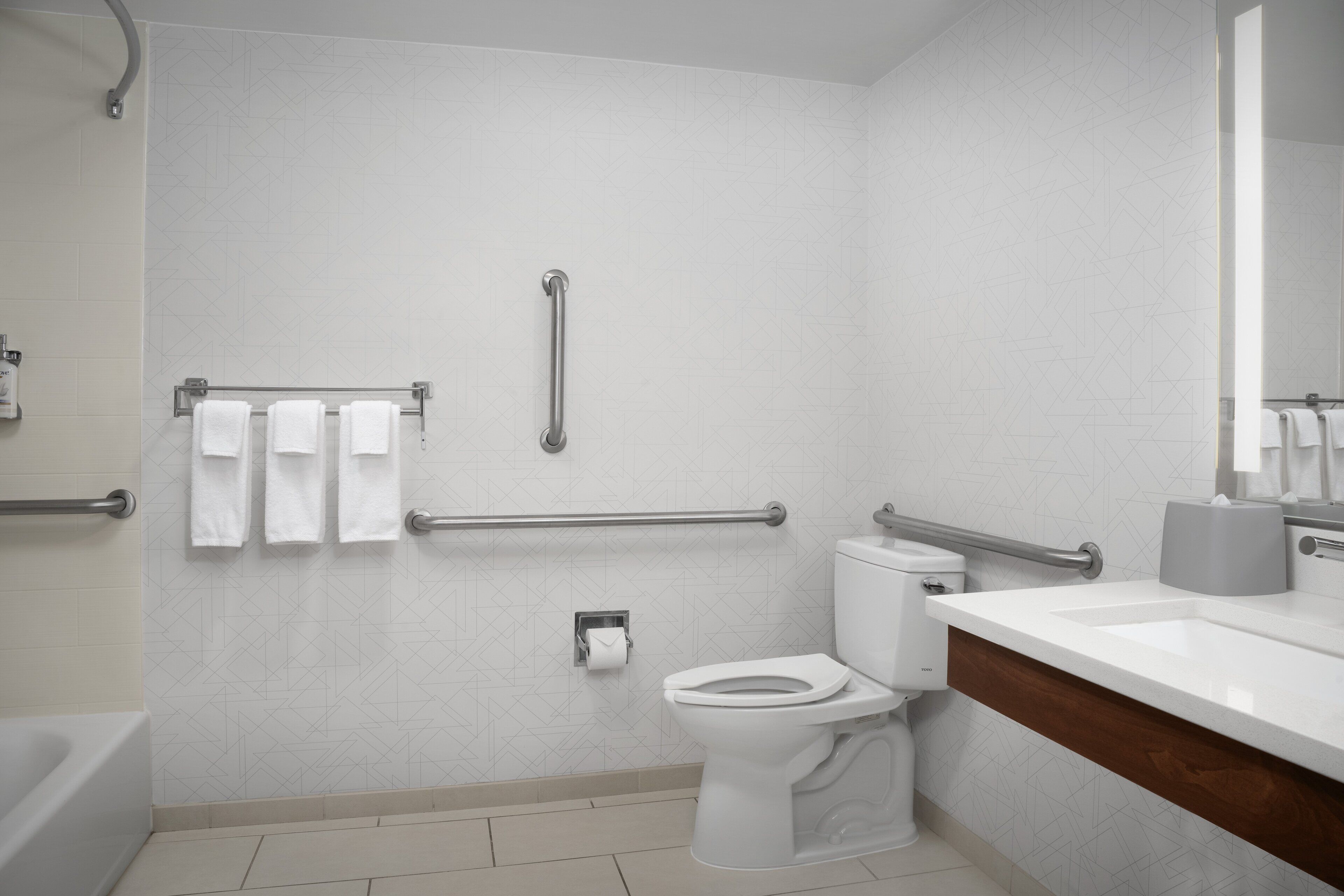 combined shower/bathtub, free toiletries, hair dryer, towels