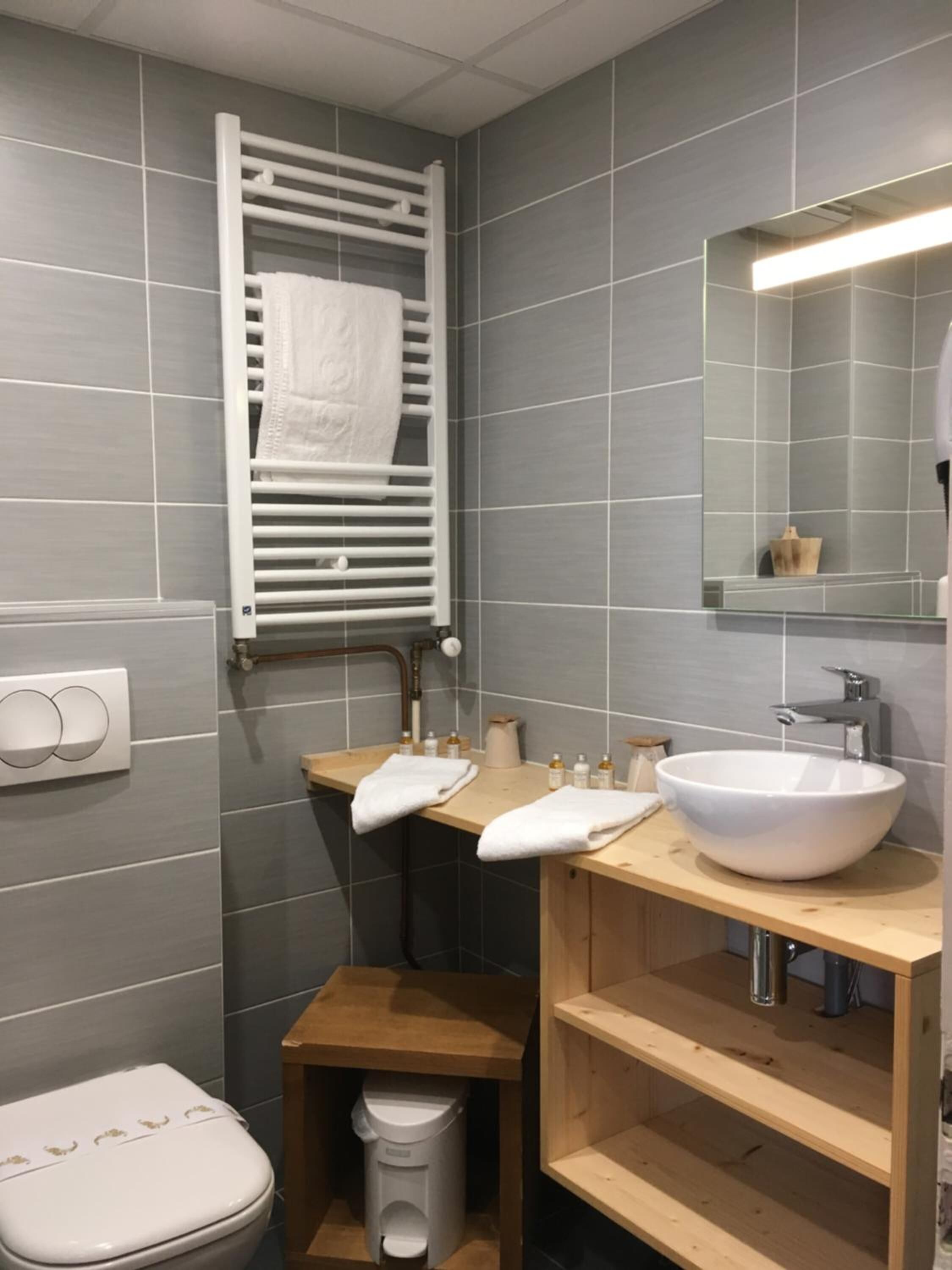 free toiletries, hair dryer, slippers, towels