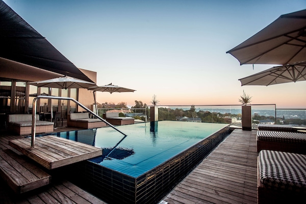 Outdoor pool, pool umbrellas, pool loungers