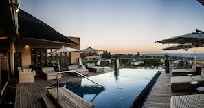 Outdoor pool, pool umbrellas, pool loungers
