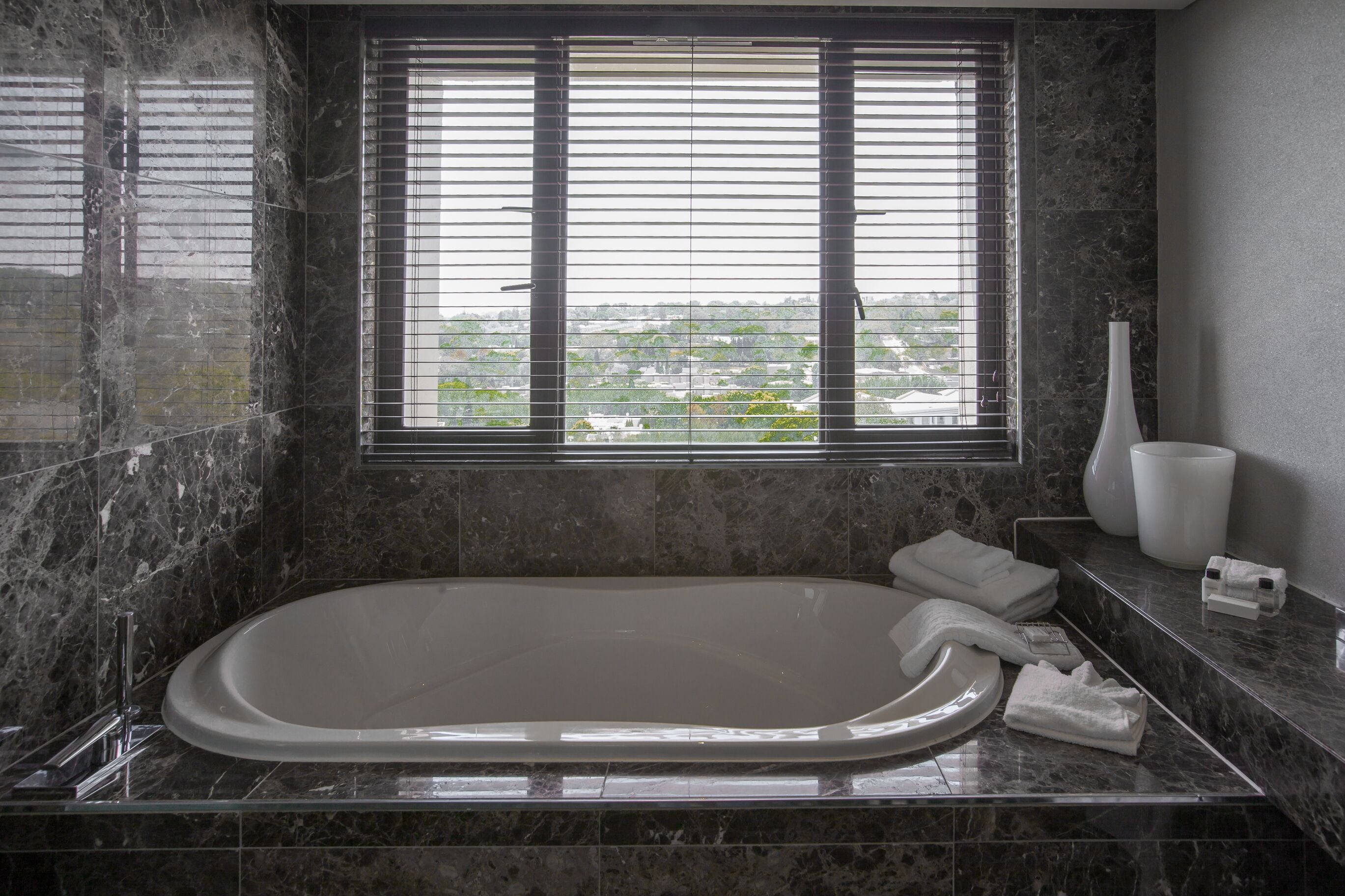 suite | bathroom | separate bathtub and shower, rainfall showerhead, designer toiletries