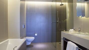 Separate bathtub and shower, rainfall showerhead, designer toiletries