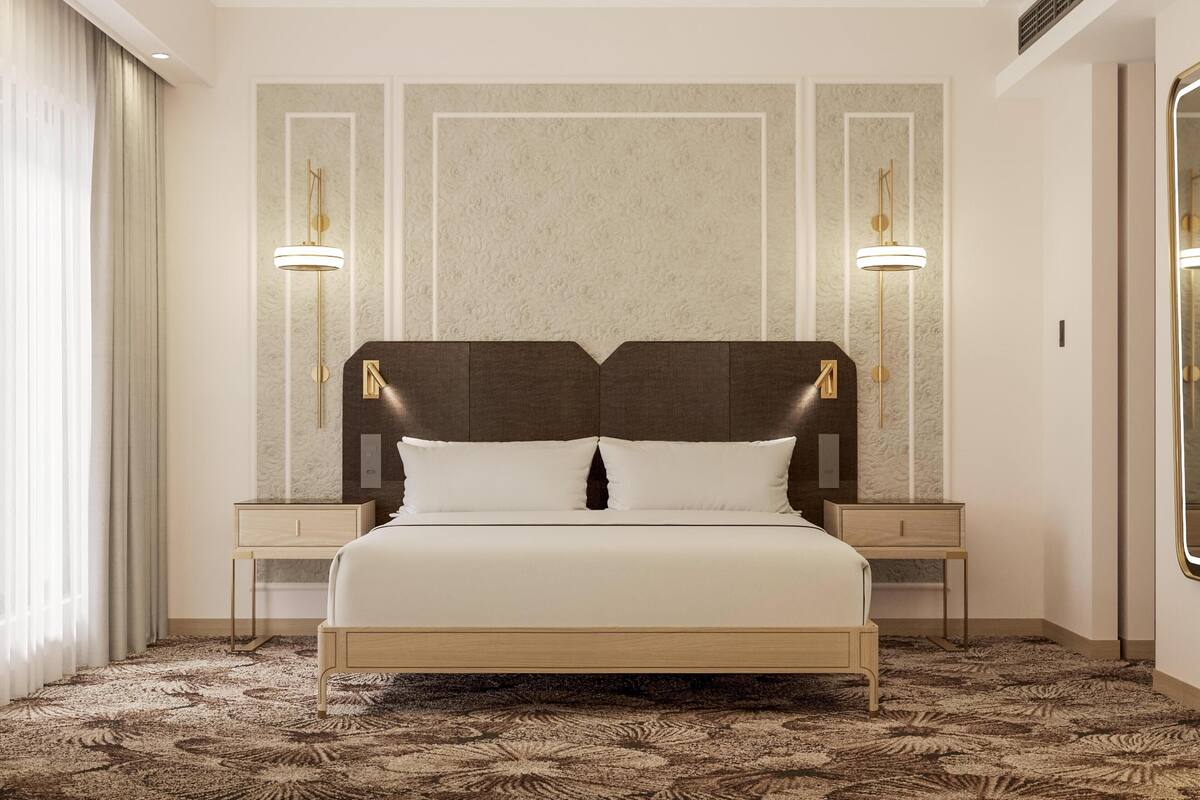Ropa de cama de alta calidad, minibar, caja fuerte y escritorio