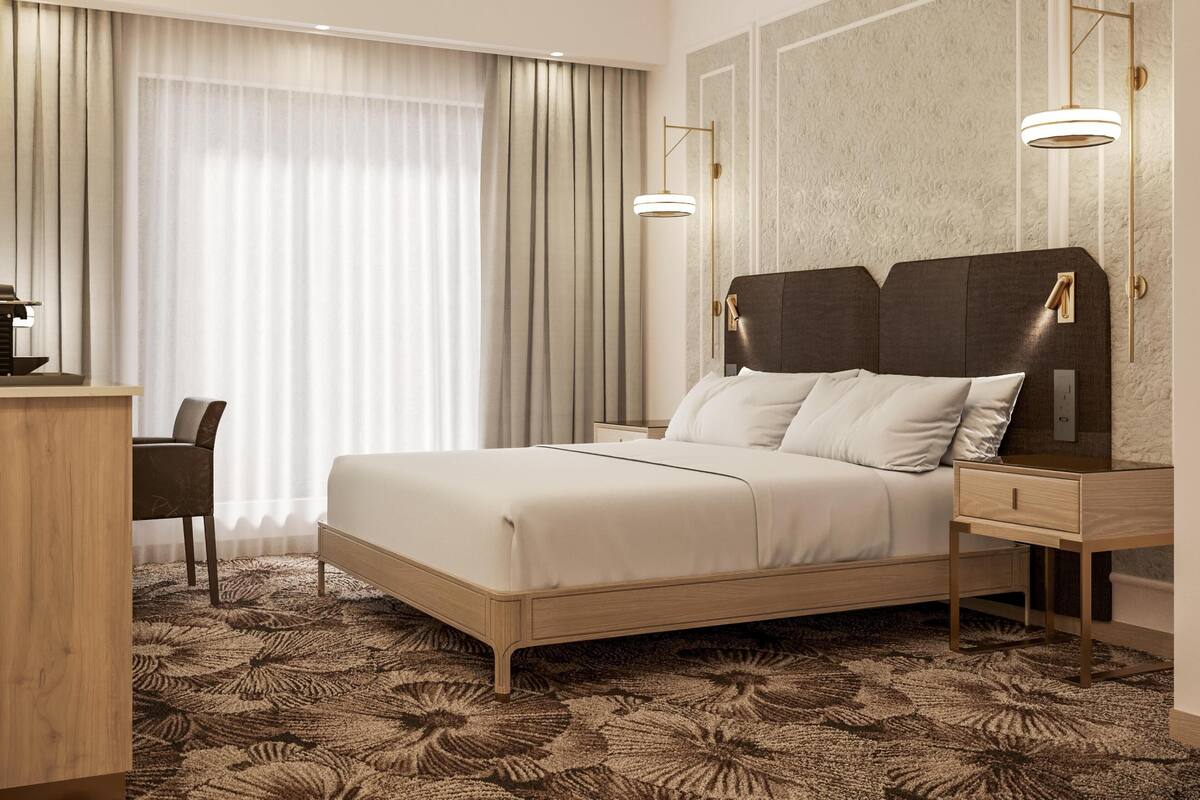 Ropa de cama de alta calidad, minibar, caja fuerte y escritorio