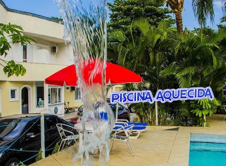 Outdoor pool, open 9:00 AM to 9:00 PM, pool umbrellas, sun loungers