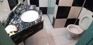 Comfort Triple Room, Ground Floor | Bathroom | Shower, hair dryer, towels