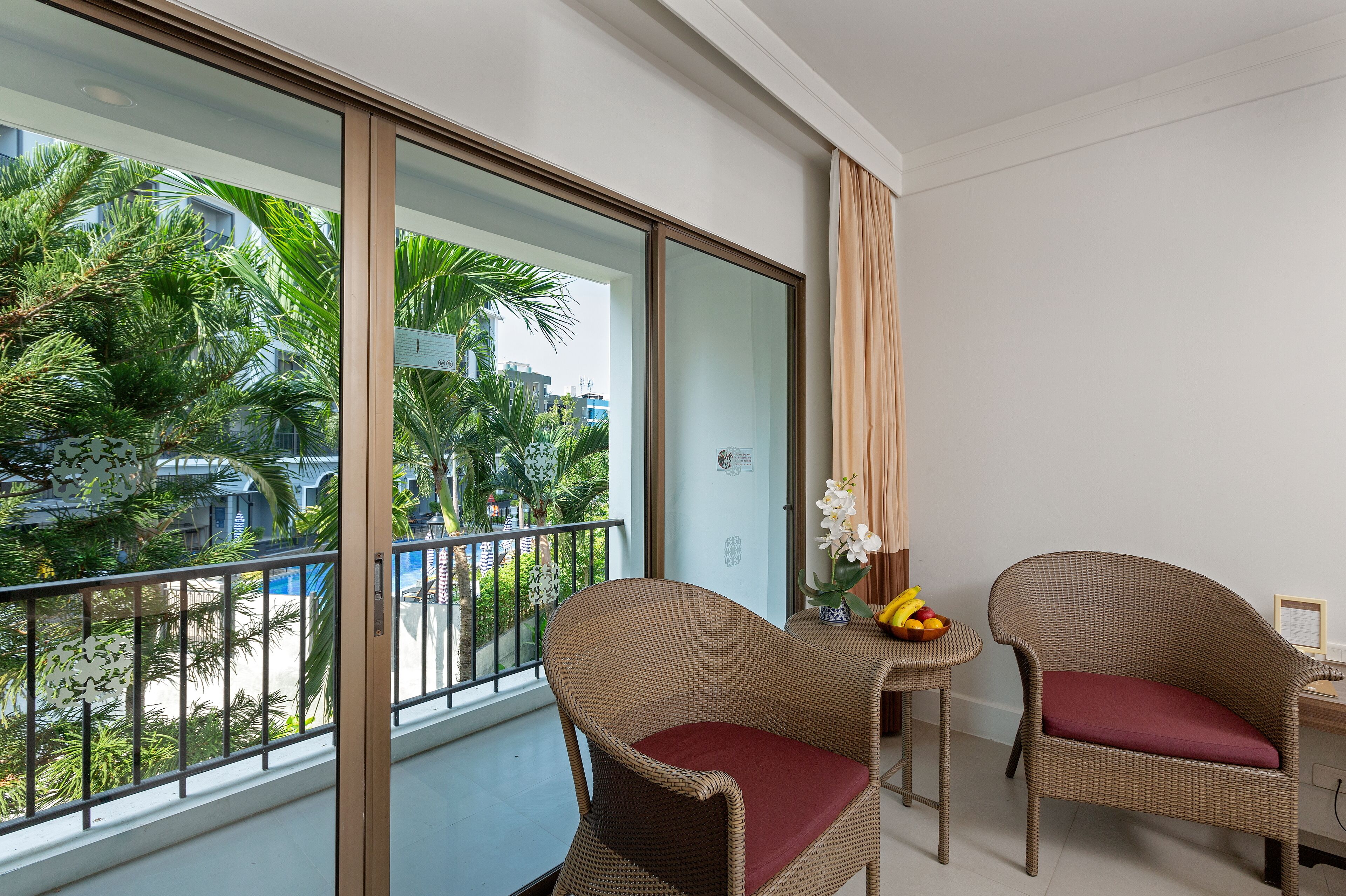 deluxe room, pool view | 1 bedroom, minibar, in-room safe, desk
