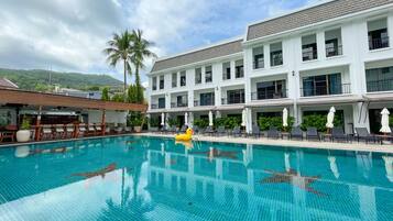 2 outdoor pools, pool umbrellas, pool loungers