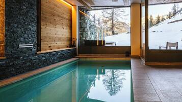 Indoor pool, open noon to 8:00 PM, sun loungers