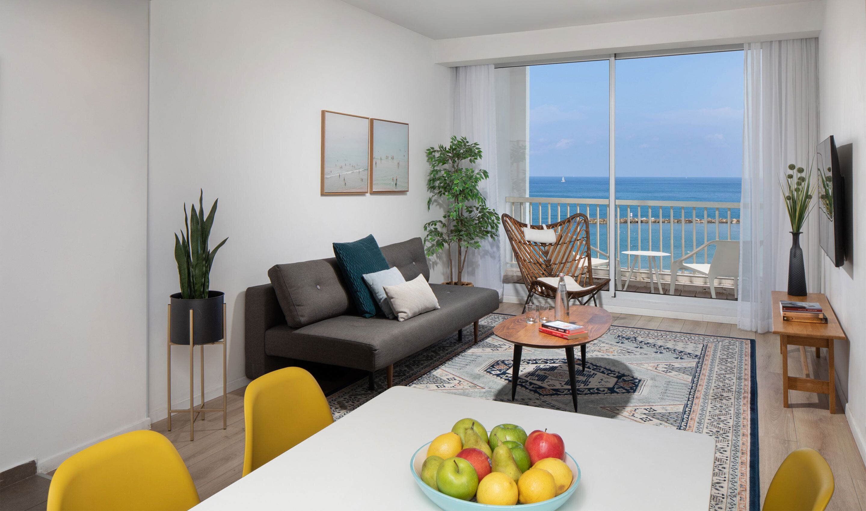 Deluxe Apartment, 2 Bedrooms, Balcony, Sea View | Living area | Books