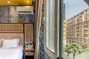 Deluxe eenpersoonskamer, uitzicht op de stad | Lakens van Egyptisch katoen, een kluis op de kamer