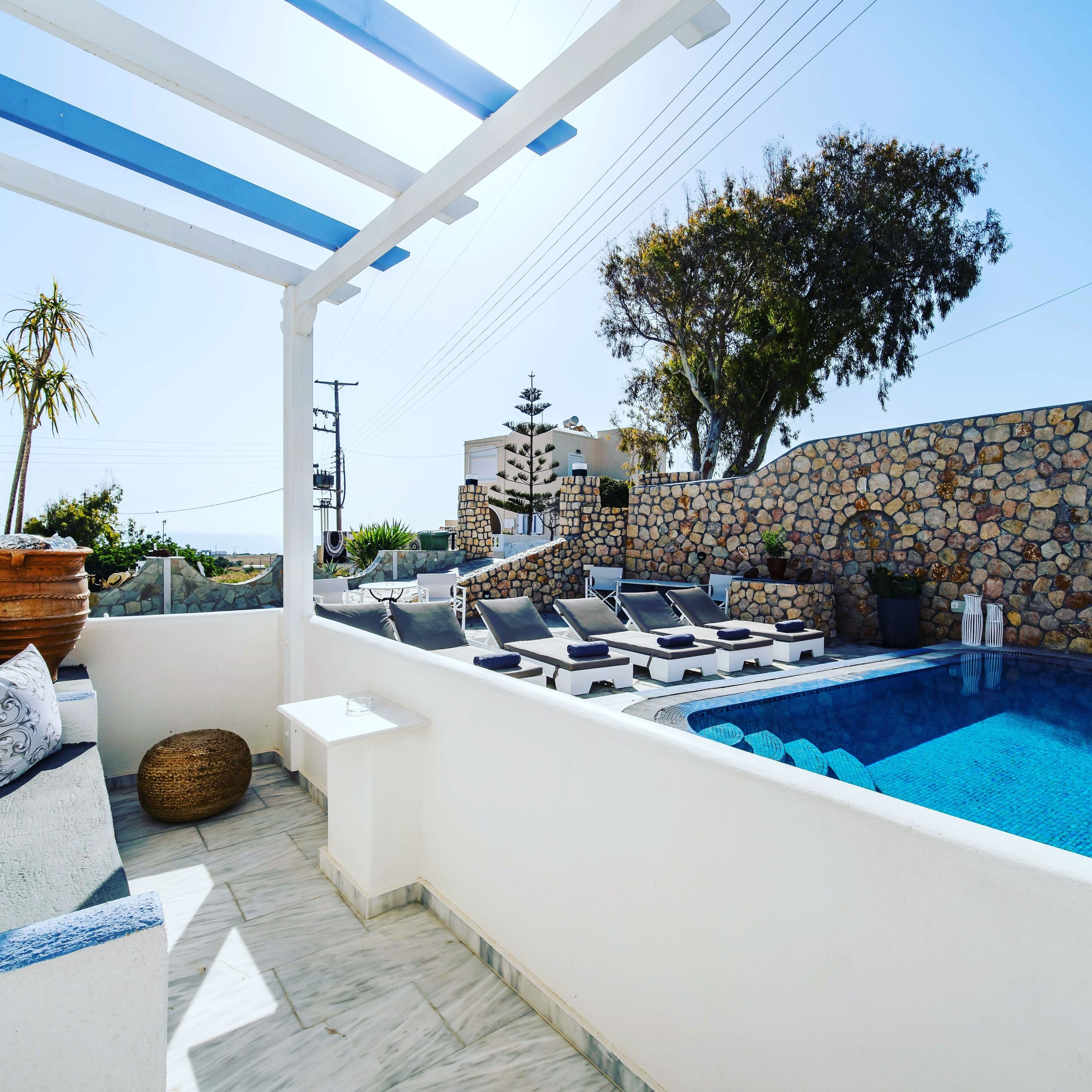 seasonal outdoor pool, open 9:00 am to 9:00 pm, pool umbrellas