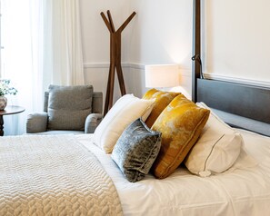 Egyptian cotton sheets, premium bedding, down comforters, minibar