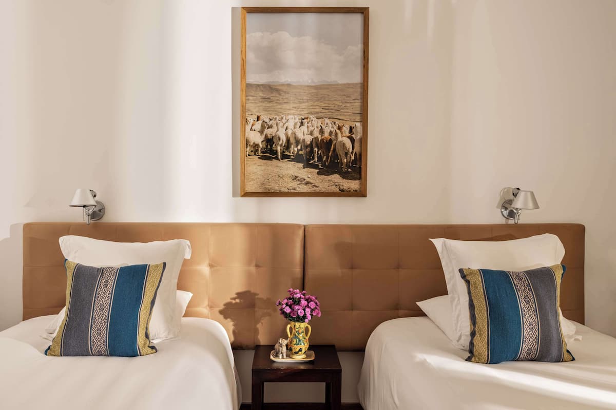 Premium bedding, down comforters, minibar, in-room safe