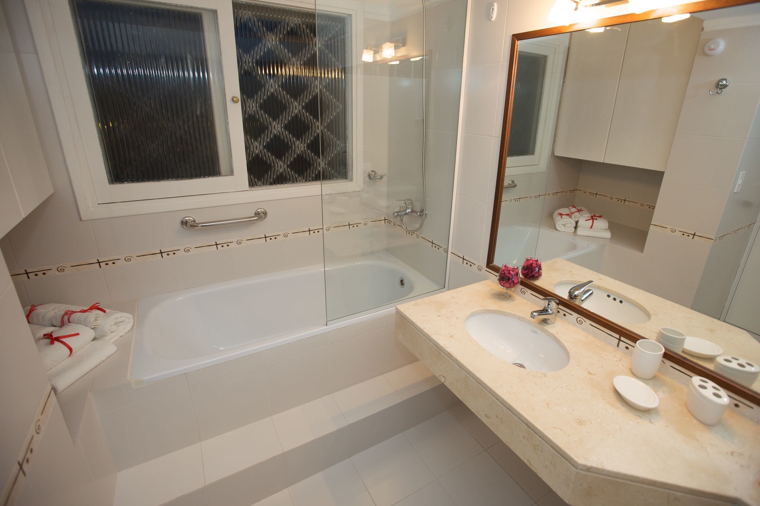 hair dryer, bathrobes, bidet, towels