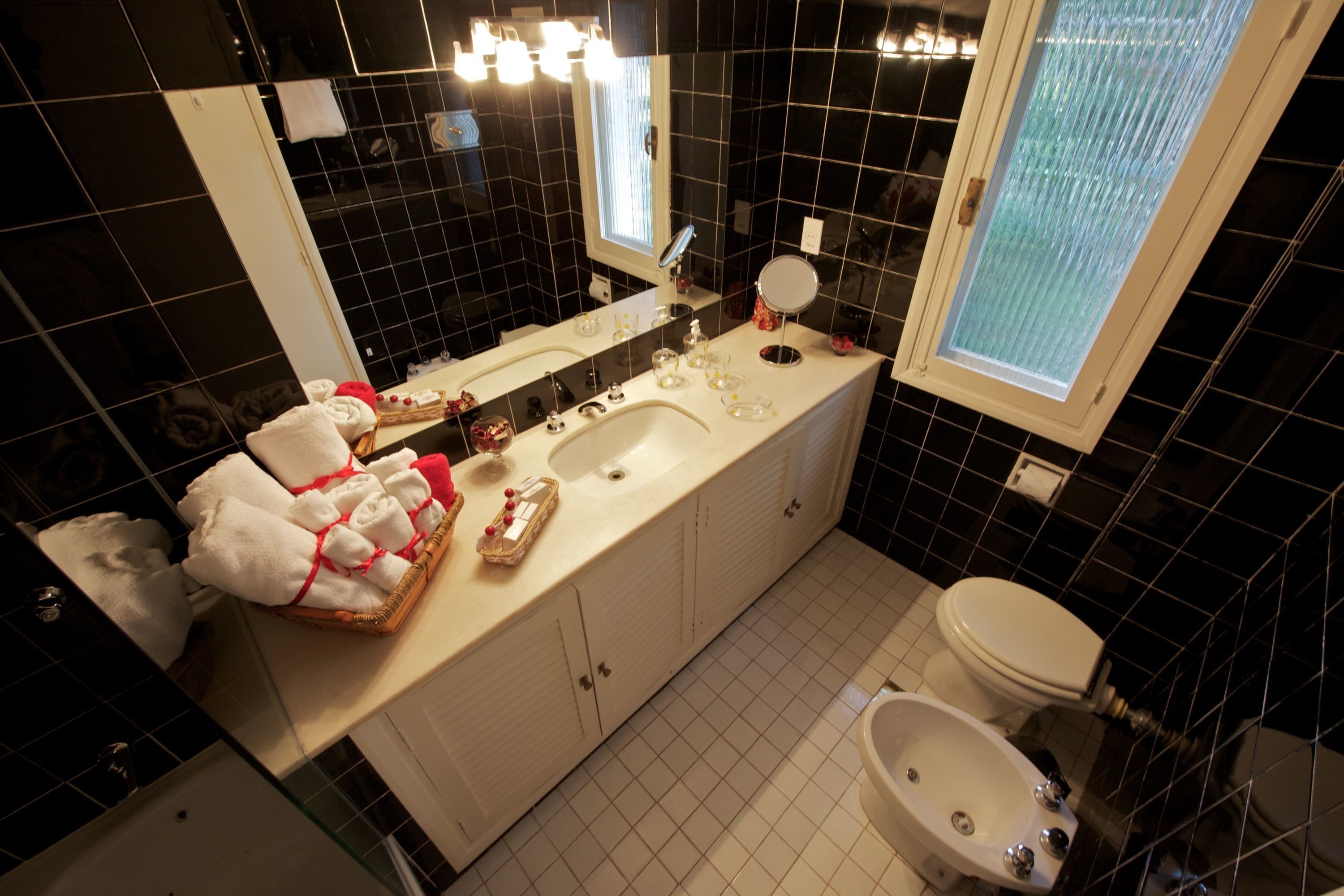 superior triple room | bathroom | hair dryer, bathrobes, bidet, towels