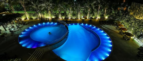 2 outdoor pools, open 10:00 AM to 10:00 PM, pool umbrellas, sun loungers