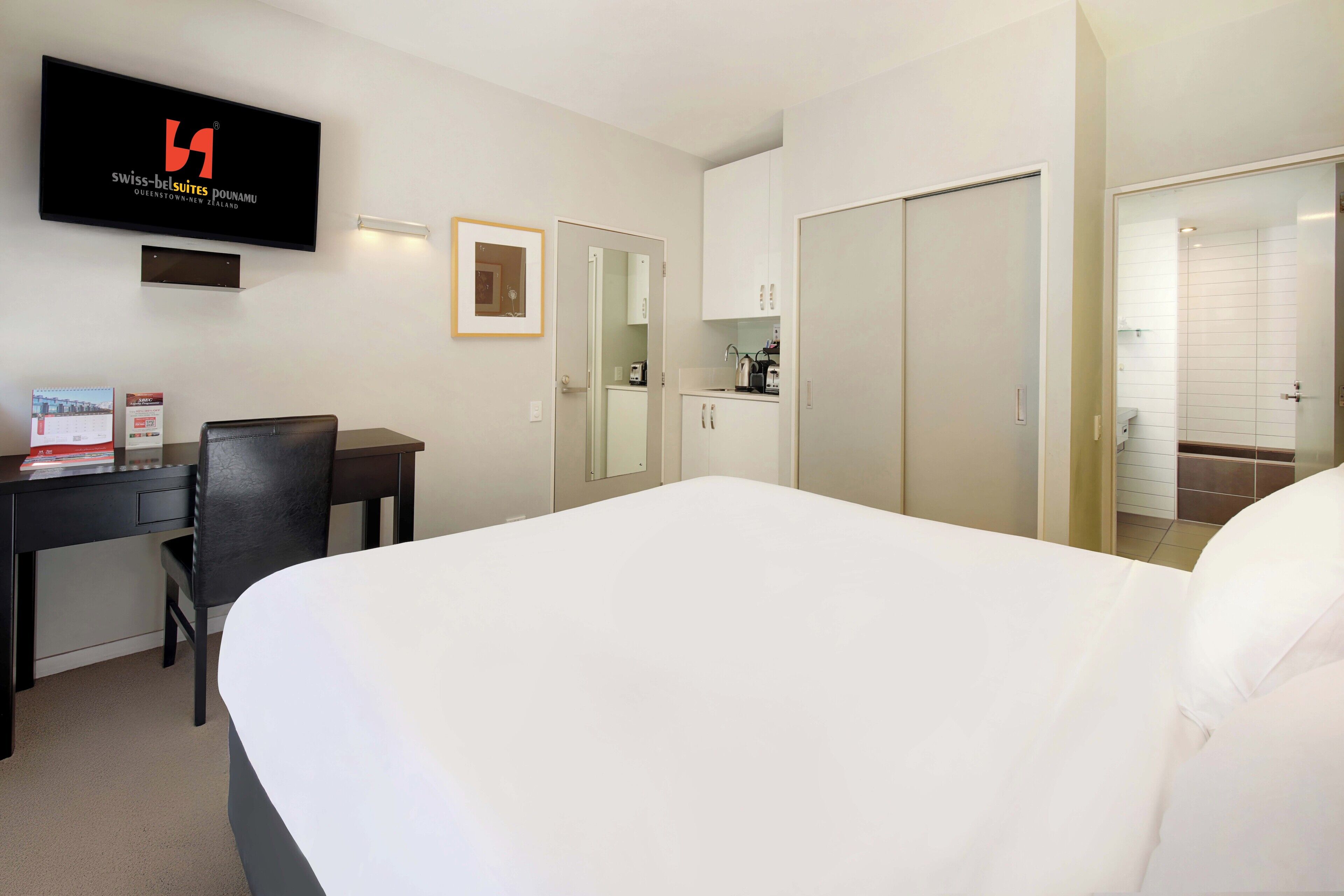 Lake View Two Bedroom Apartment with Balcony and Two Bathrooms | Premium bedding, desk, laptop workspace, soundproofing
