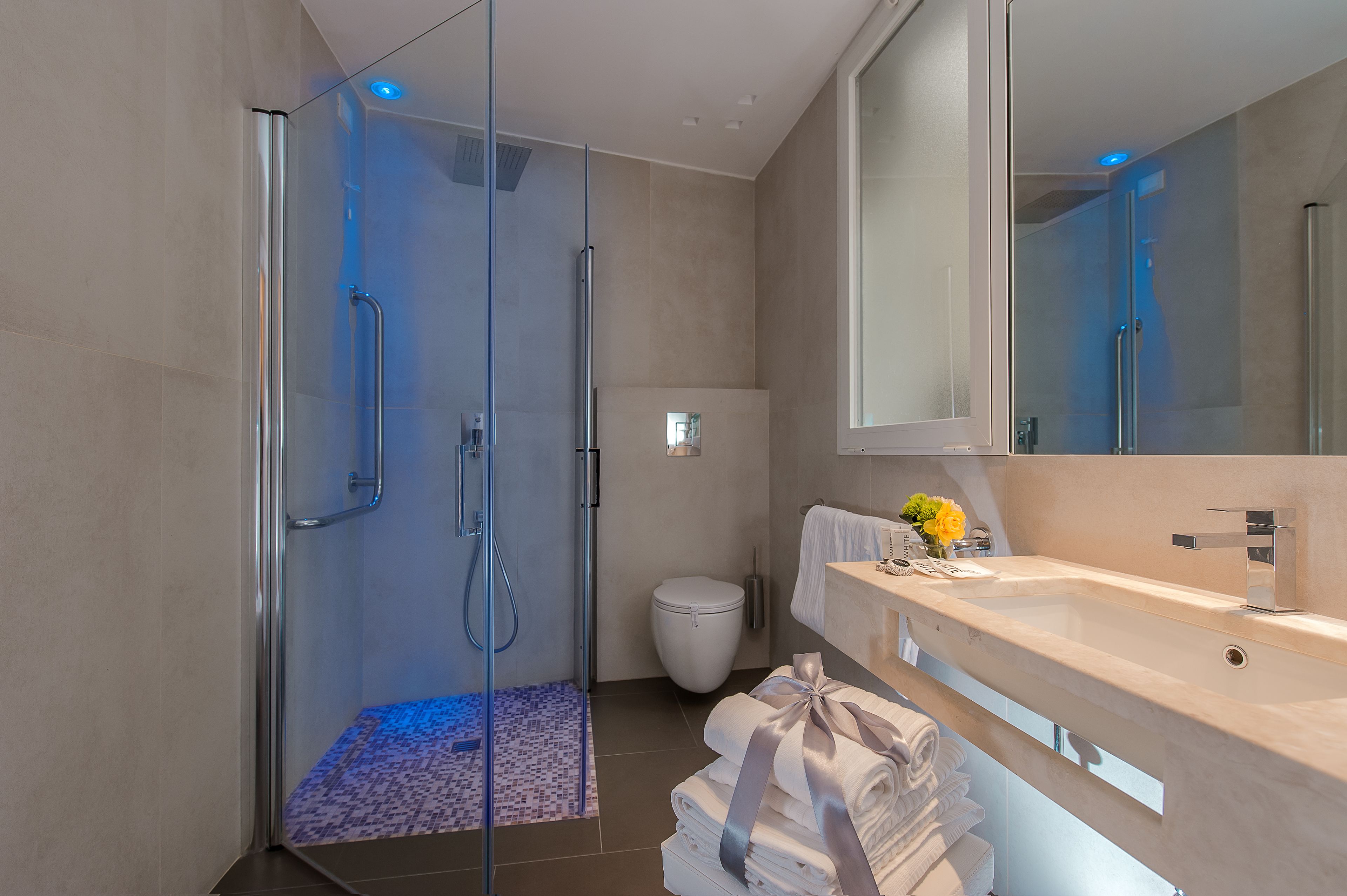 free toiletries, hair dryer, slippers, towels