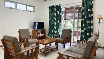 Apartment, 3 Bedrooms | Living area | TV