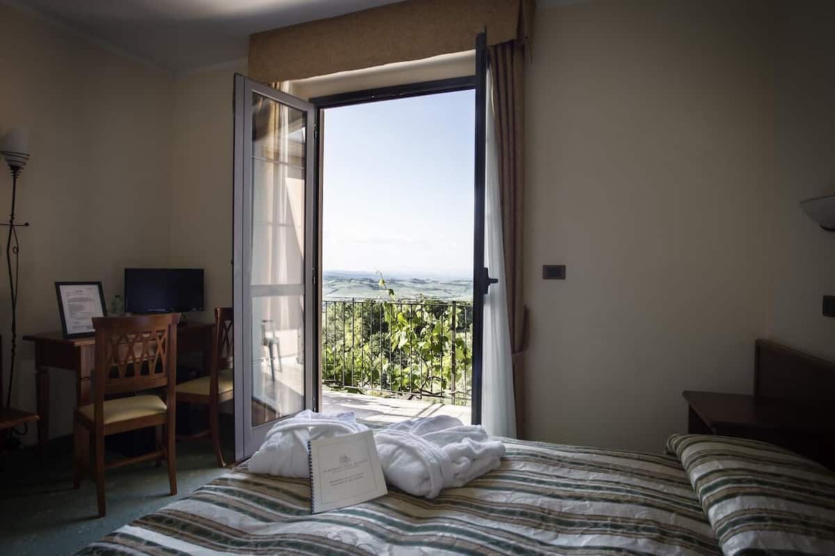 Down duvets, minibar, in-room safe, desk
